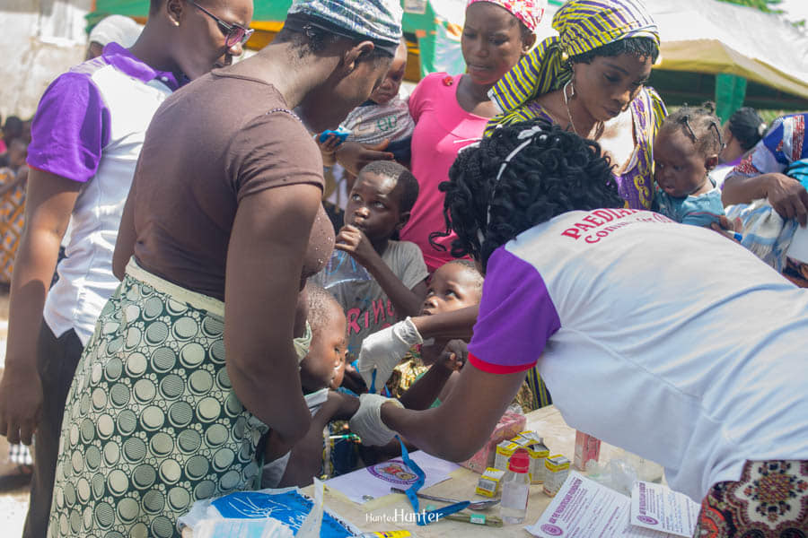 Paediatrician consulting with family